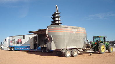 Tractor and mixer with a semi-truck and trailer
