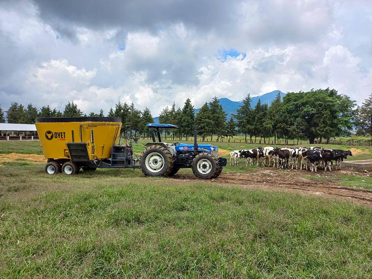 Dyet Single Auger being pulled by tractor
