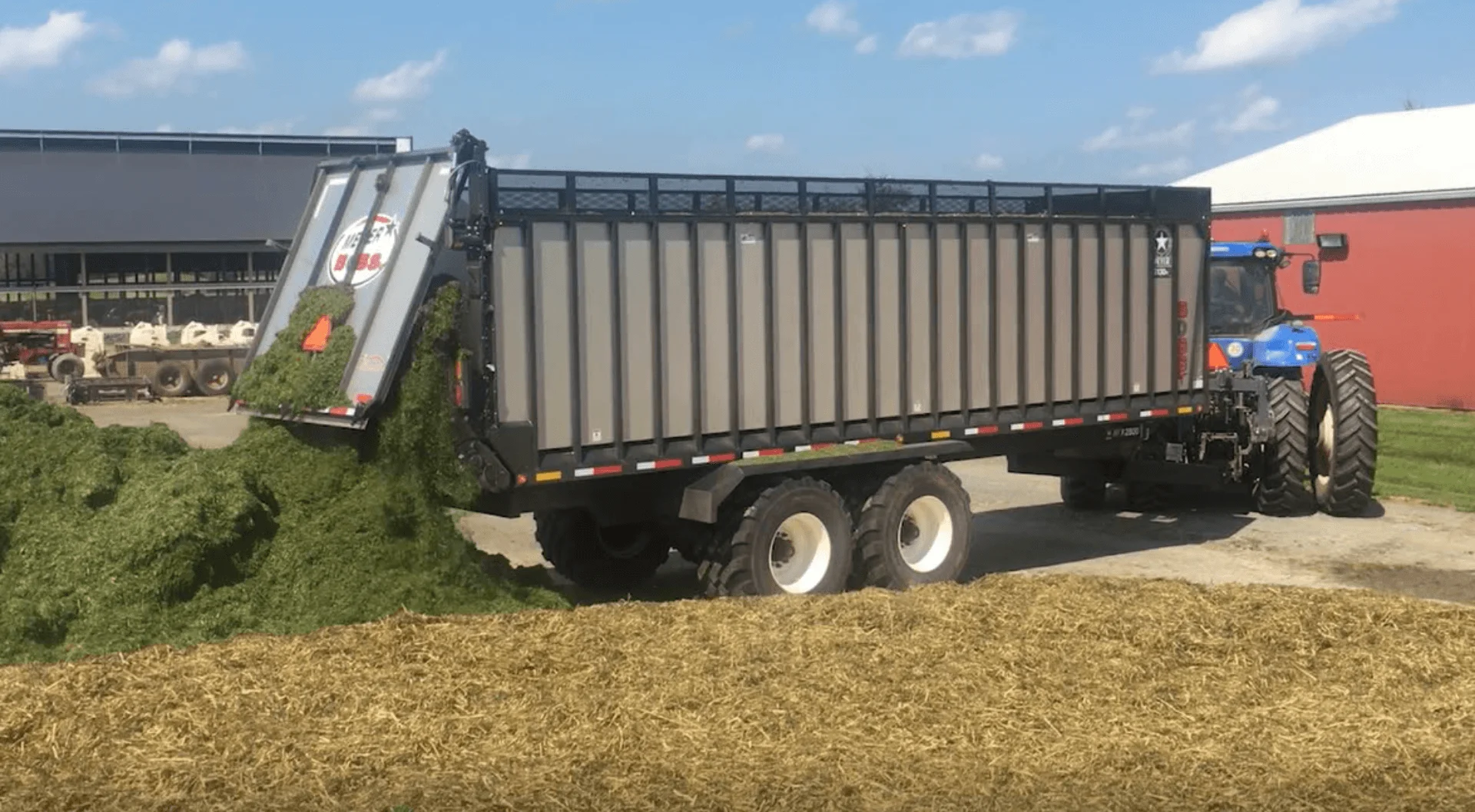 Tractor dumping manure